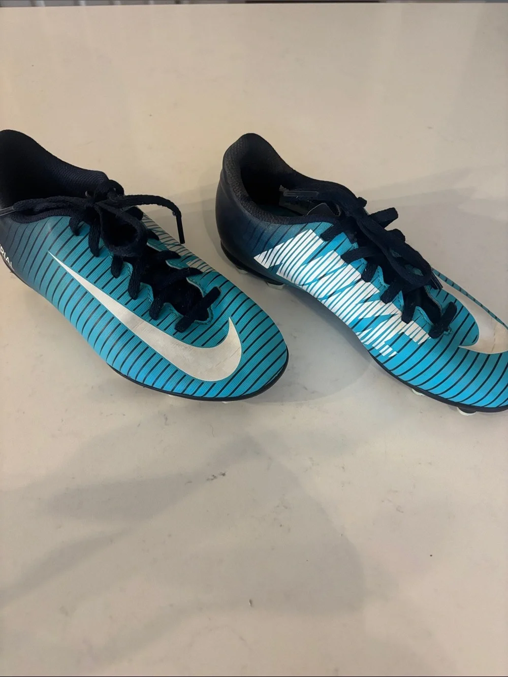 Nike Kids Teal and Navy Striped Soccer Shoes